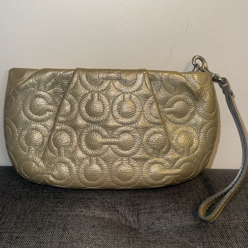 Coach Signature Debossed Gold Patent Leather Wristlet 43229